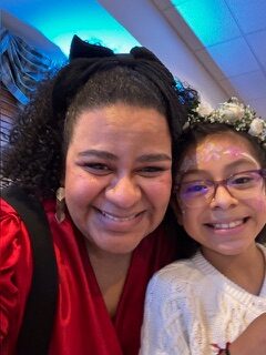FEC Elisa Lopez at a camper's first communion